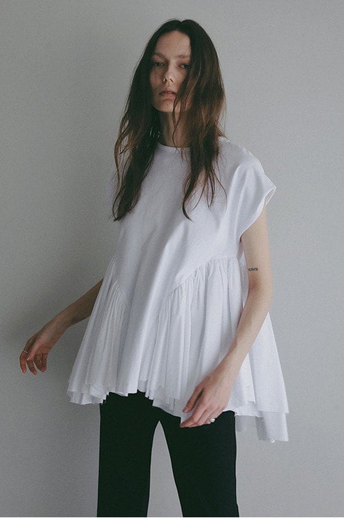 DOCKING PEPLUM CUT TOPS