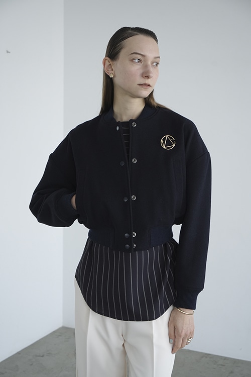 BROOCH SET OVER SHOULDER STADIUM JUMPER